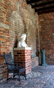 Poe bust in the courtyard at the Poe Museum